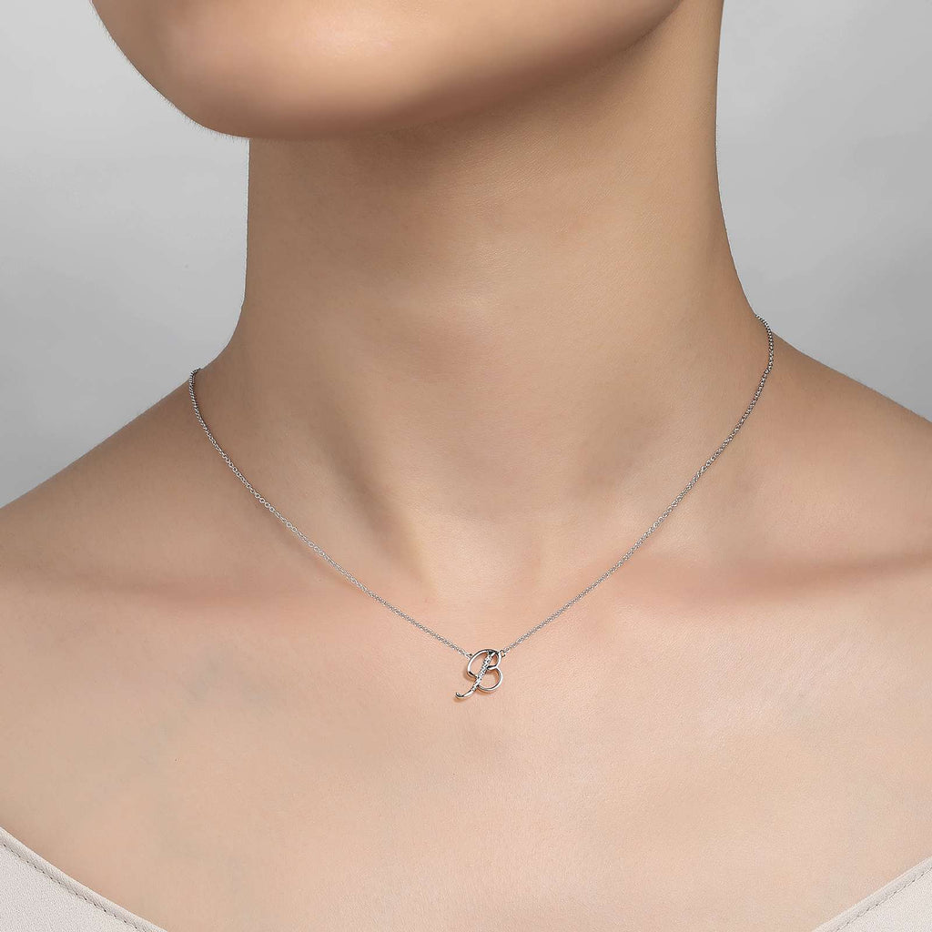 Platinum necklace with initial pendant.