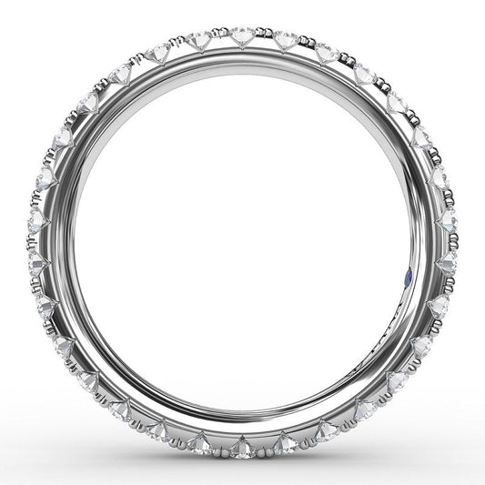 14K white gold eternity band with diamonds.