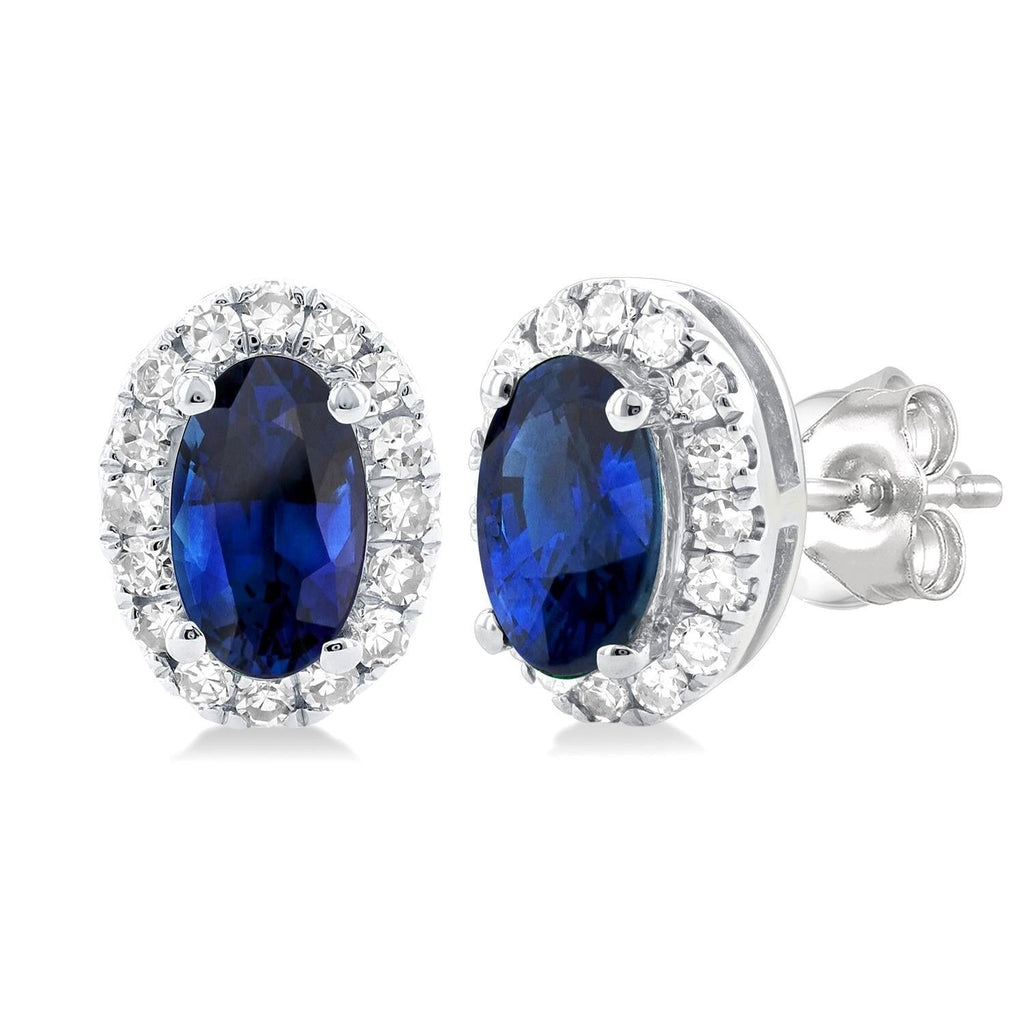 Oval sapphire earrings with diamond halo.