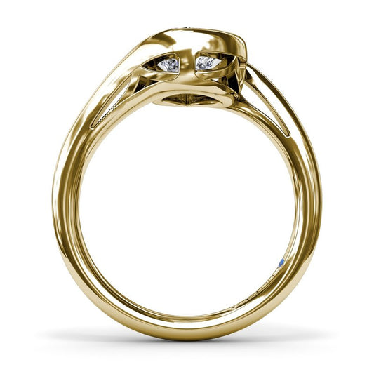 Yellow gold ring with diamond accents.