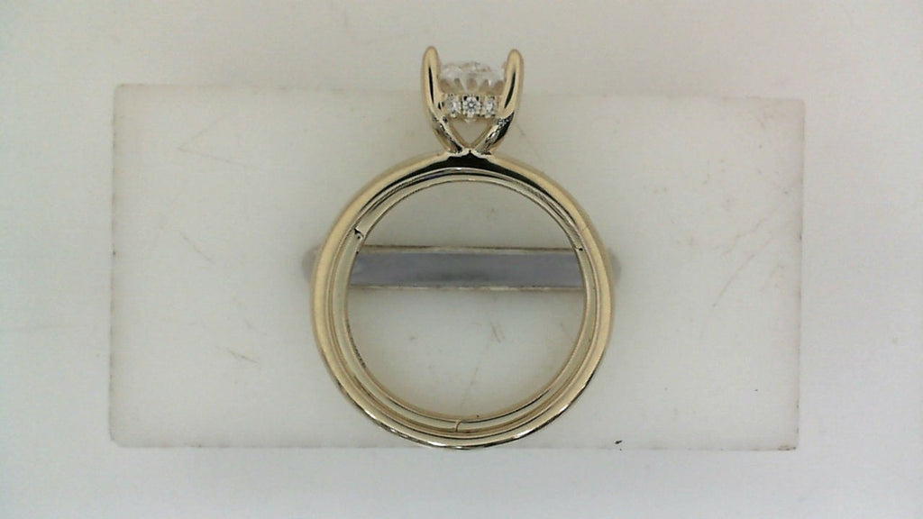 14K yellow gold ring with diamond accents.