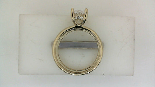 14K yellow gold ring with diamond accents.