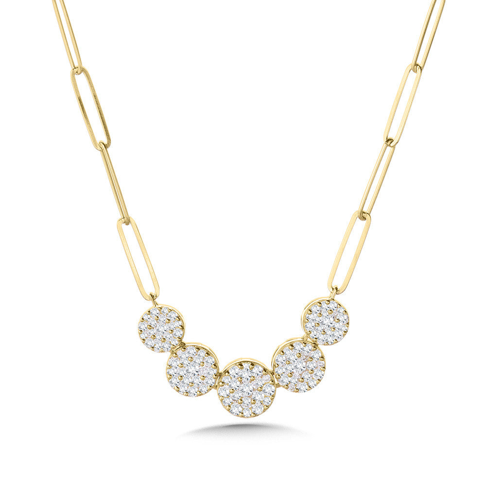 Yellow gold necklace with round diamond clusters.