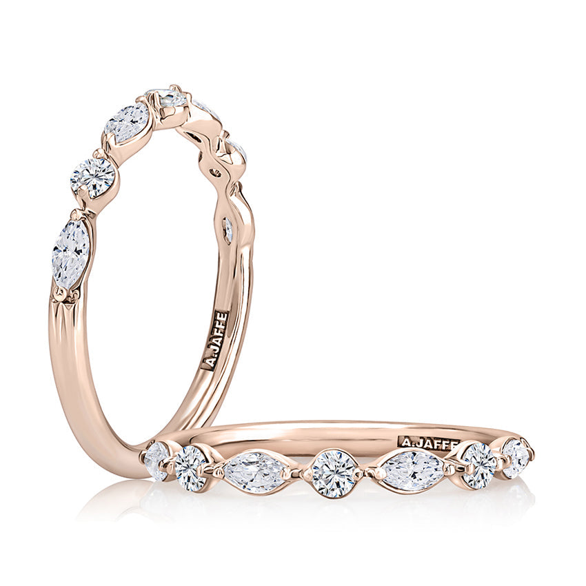 Rose gold band with marquise diamonds.