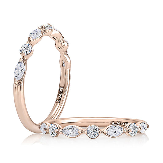 Rose gold band with marquise diamonds.