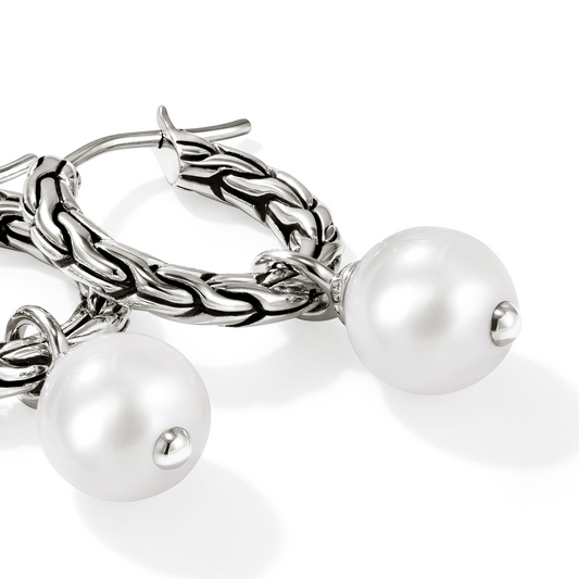 Sterling silver hoops with cultured pearls.