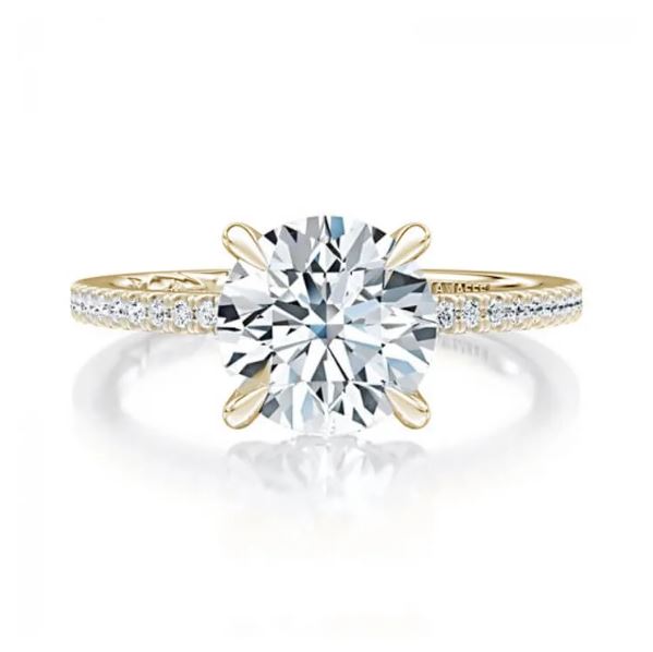 Two-tone diamond engagement ring with round diamonds.
