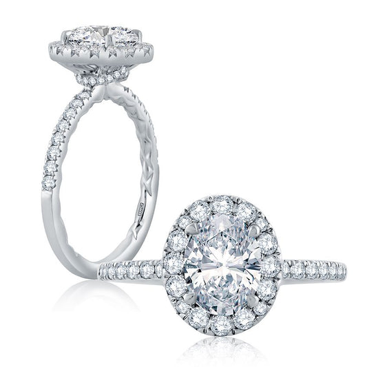 Halo diamond ring in white gold.