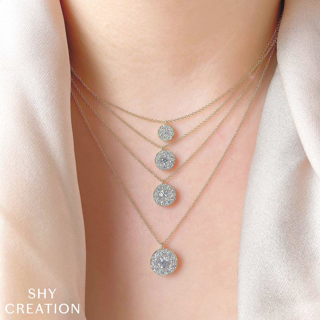 Diamond necklace in white gold on model.