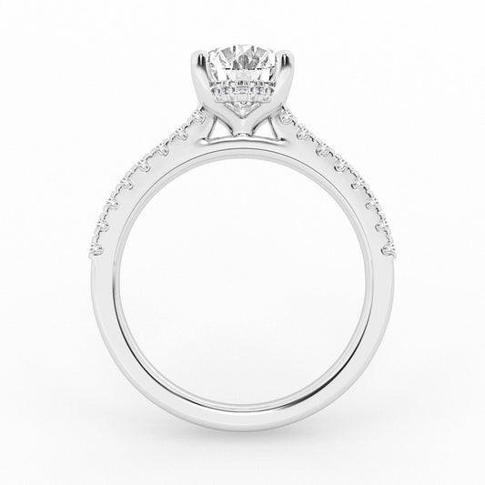 Oval diamond ring, white gold, accent stones.