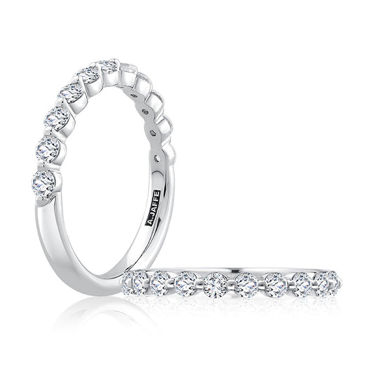 Rose gold band with round diamonds.