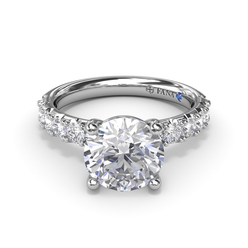 14K white gold ring with emerald diamonds.