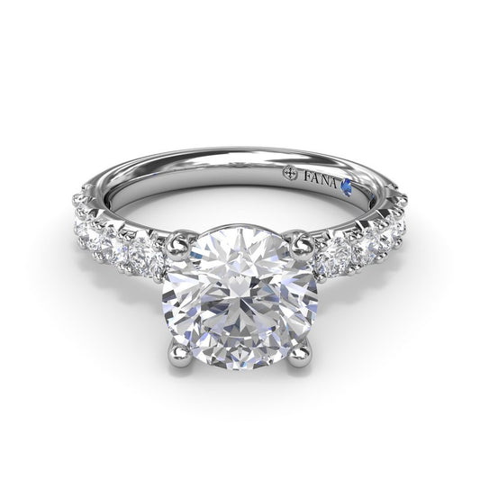 14K white gold ring with emerald diamonds.