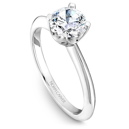 14K white gold solitaire engagement ring.