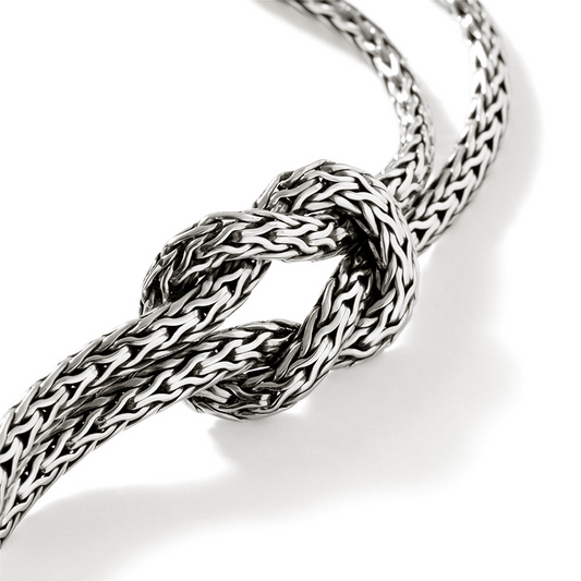 Sterling silver woven knot bracelet design.