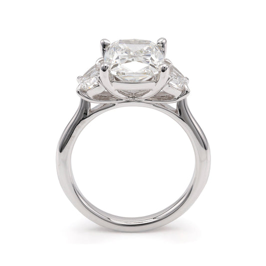 Three-stone white gold engagement ring.