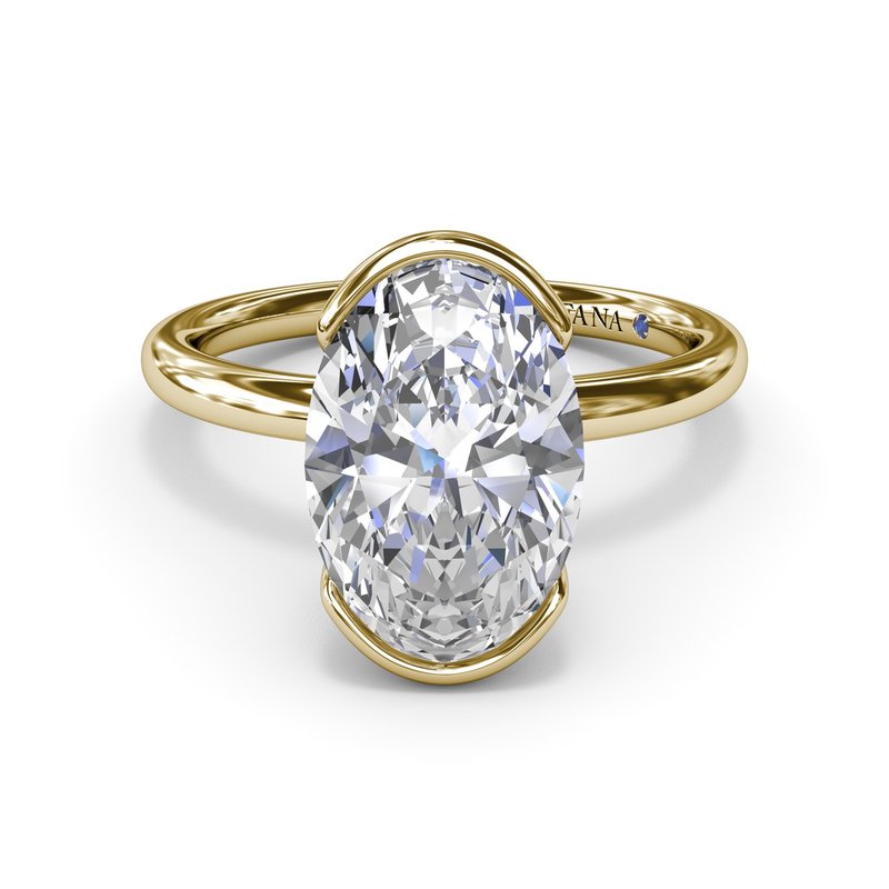 14K yellow gold solitaire diamond ring.