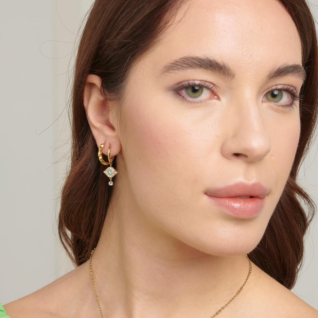 Gold-plated dangle earrings with yellow crystals.