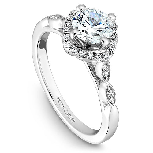 Halo diamond ring with twisted band design.