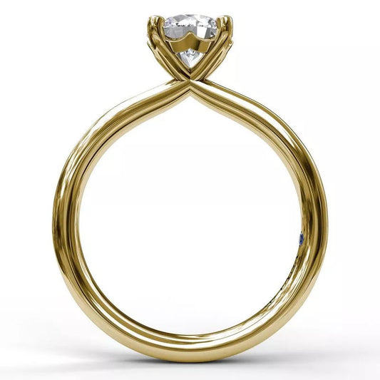 14K yellow gold solitaire engagement ring.