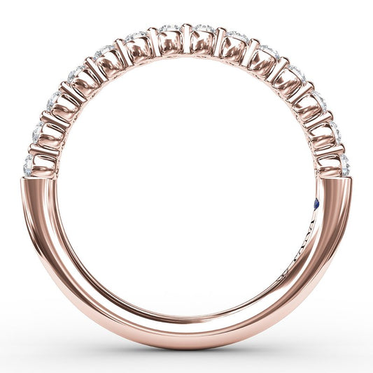 Rose gold band with round diamonds.