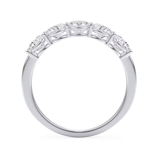 Platinum band with five round diamonds.