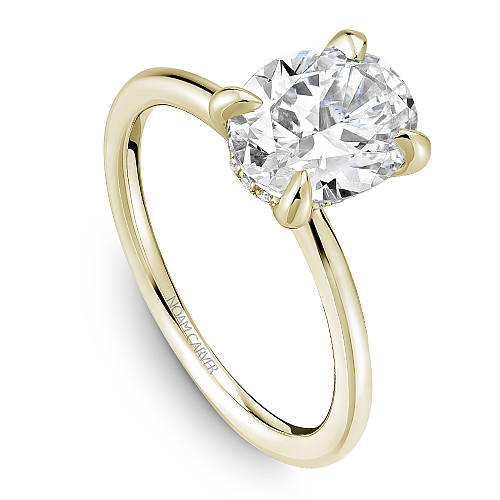 Yellow gold solitaire ring with accent diamonds.