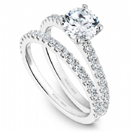 14K white gold band with round diamonds.