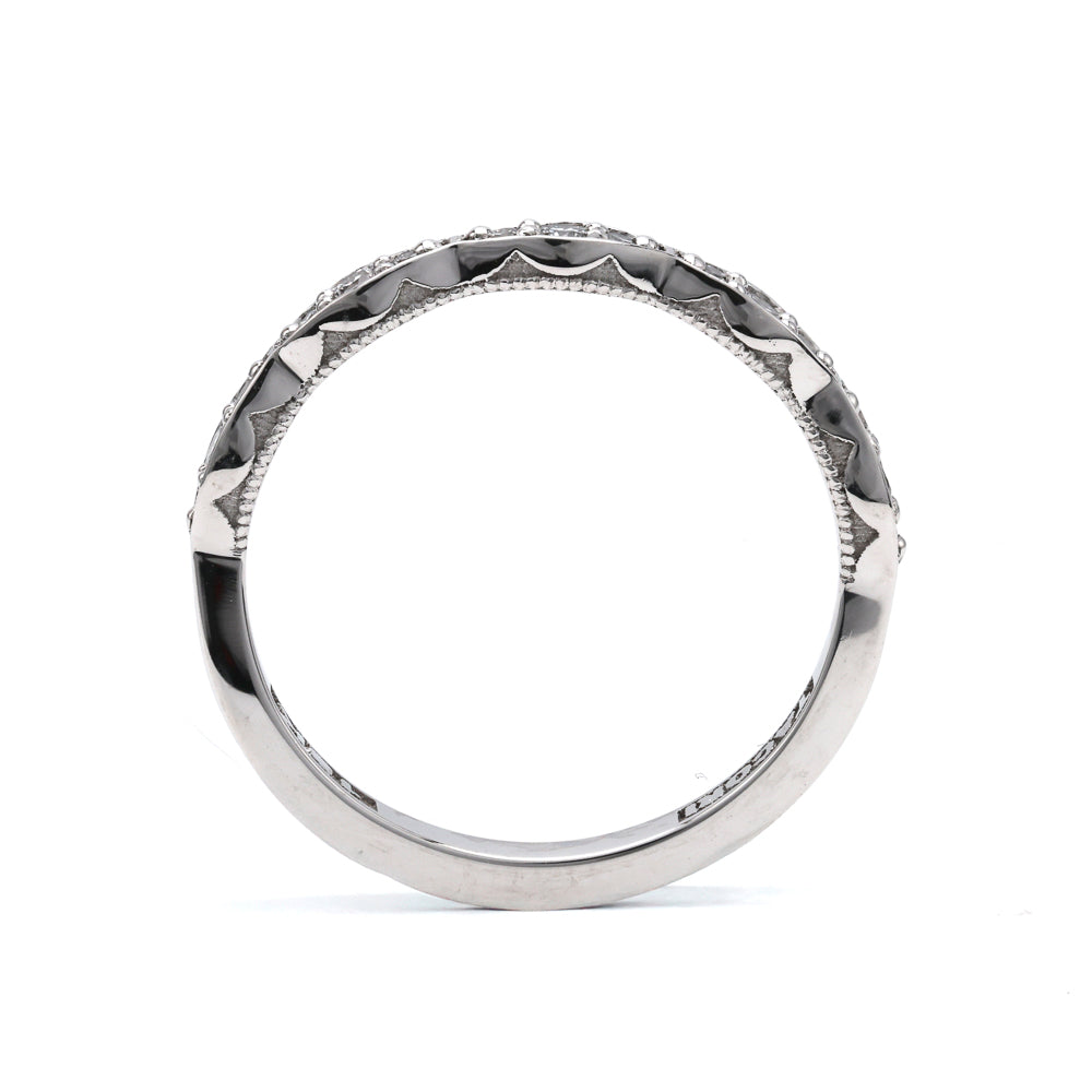 18K white gold band with diamond accents.