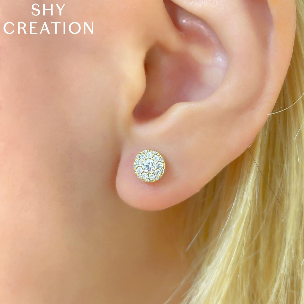 14K yellow gold diamond stud earrings.