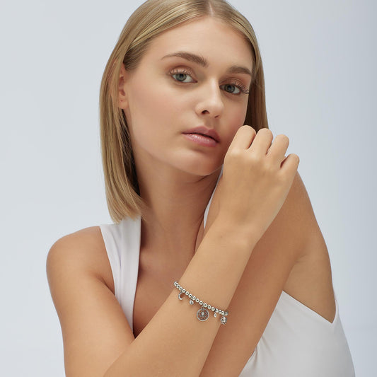 Simulated diamond bead bracelet on wrist.