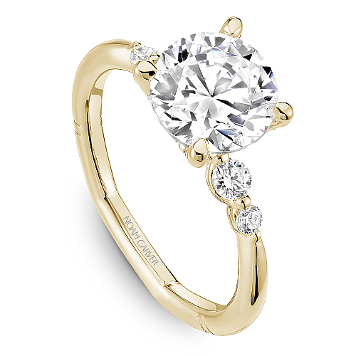 14K yellow gold ring with round diamonds.