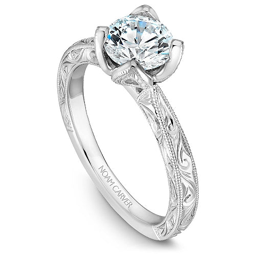 Engraved white gold ring with solitaire setting.