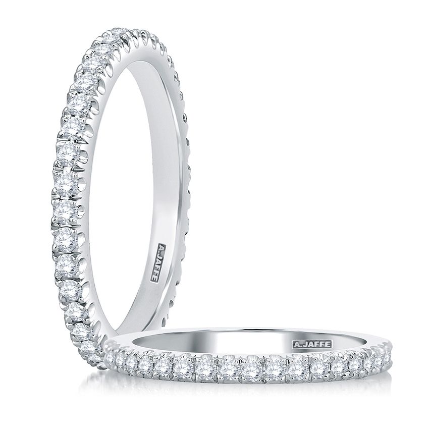 Diamond eternity band, 14K white gold.