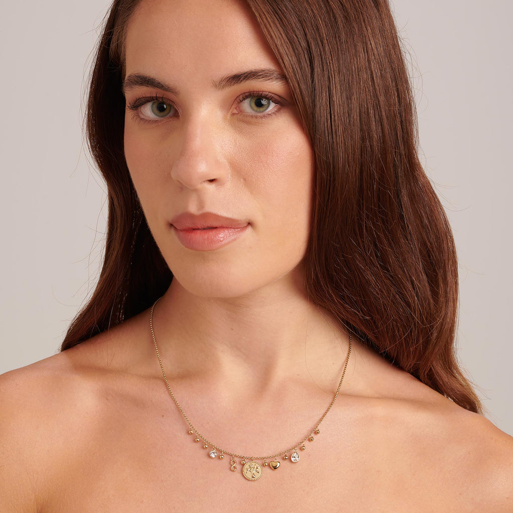 Yellow stainless steel necklace with simulated diamonds.