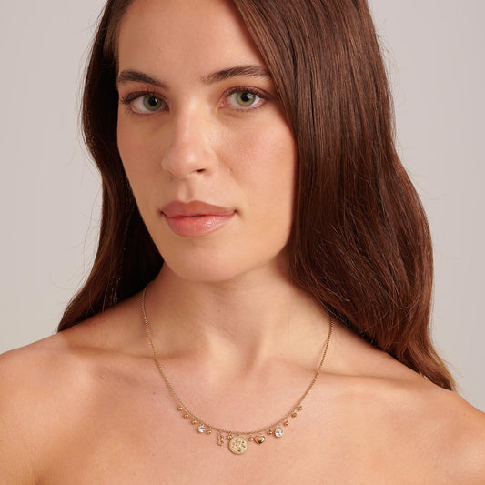 Yellow stainless steel necklace with simulated diamonds.