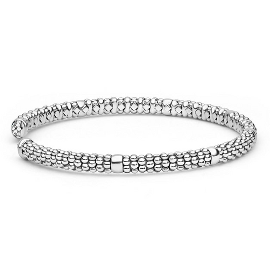 Sterling silver cuff bracelet with diamond accents.