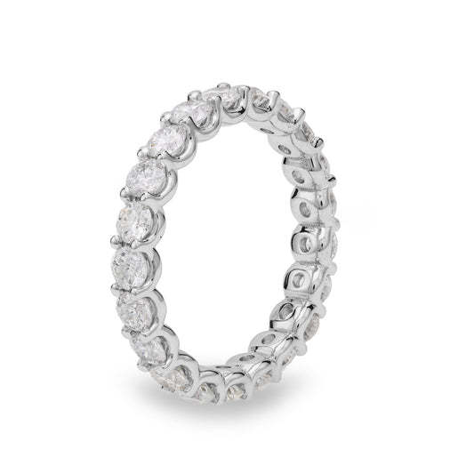Diamond eternity band with round stones.