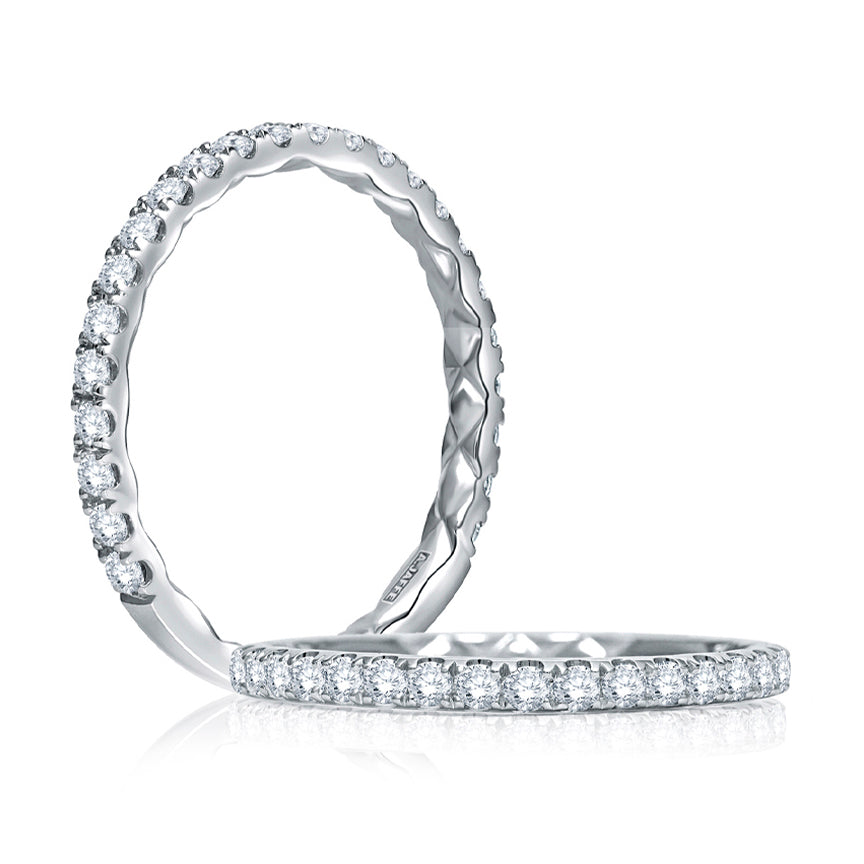 Diamond band in 14K white gold.