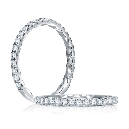 Diamond band in 14K white gold.