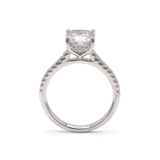 14K white gold ring with cushion-cut diamond.