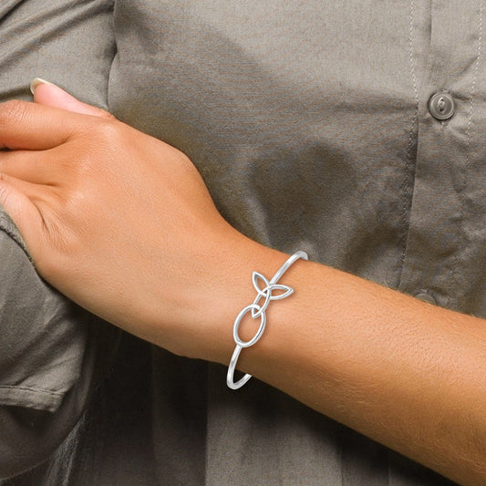 Sterling silver cuff bracelet with knot design.