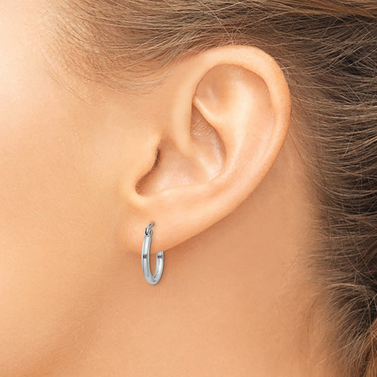 14K white gold polished hoop earrings.