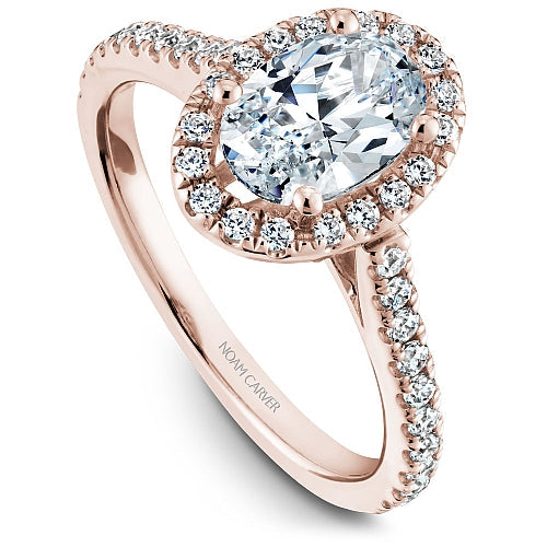 Rose gold diamond halo engagement ring.