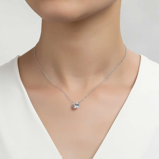 Simulated diamond necklace on woman's neck.