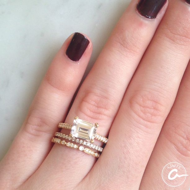 A. Jaffe diamond ring on hand.