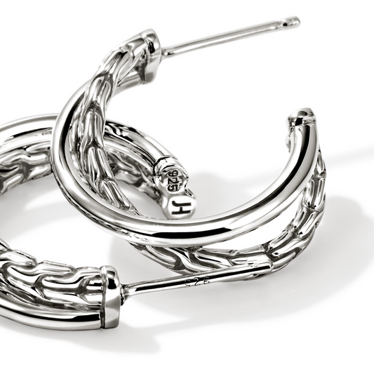 Sterling silver J hoop earrings, polished finish.