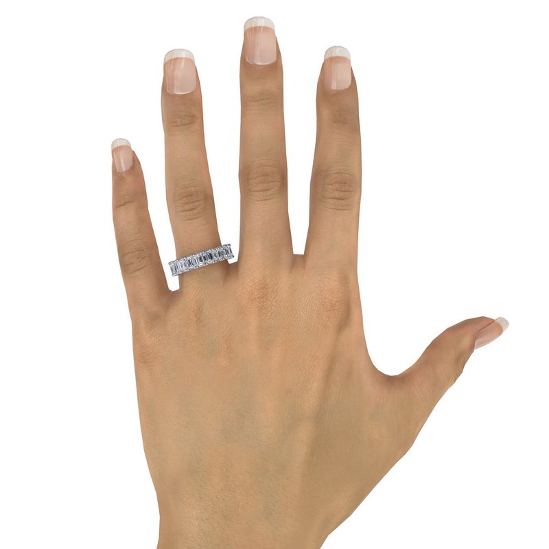 14K white gold band with emerald diamonds.