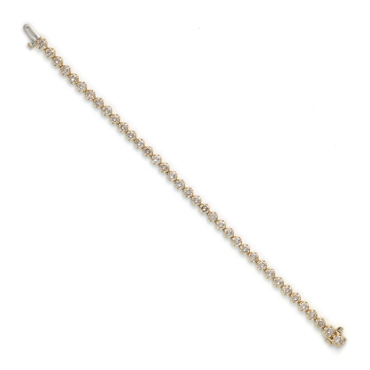 Champagne diamond bracelet in yellow gold.
