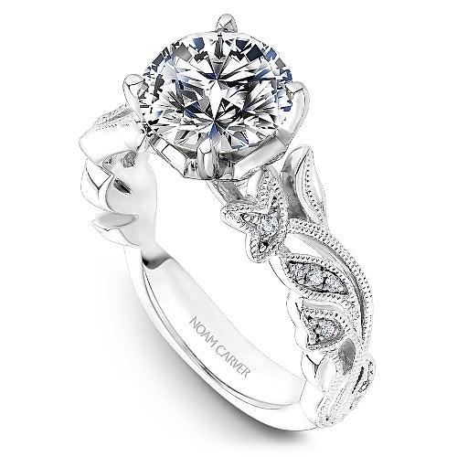 White gold ring with intricate diamond accents.